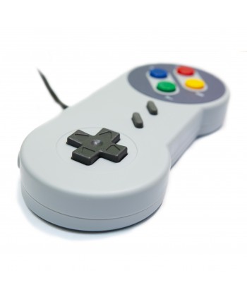 Manette Nintendo SuperNes grise vue plongeante.